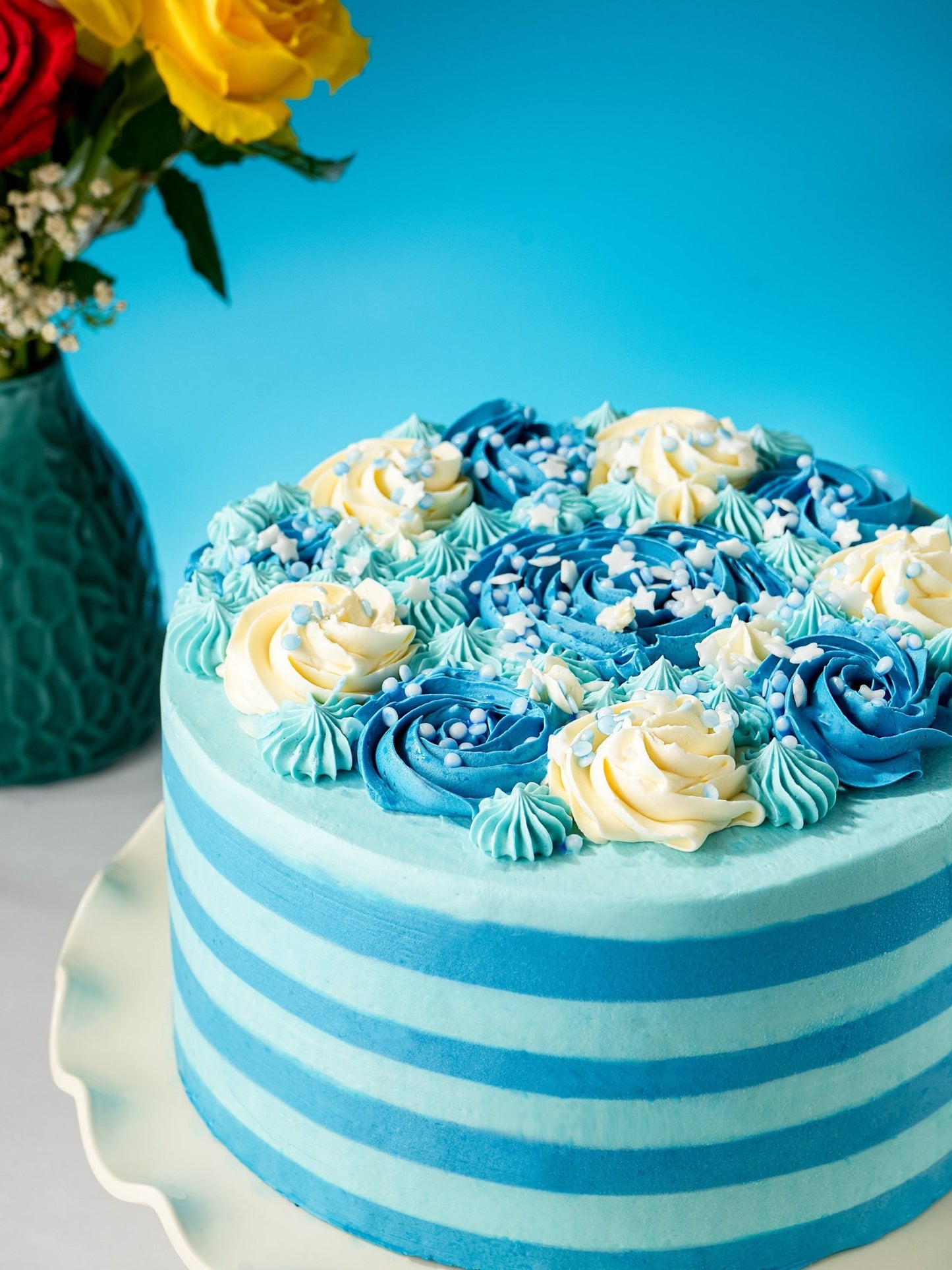 Patisserie Valerie's handmade Blue Candy Stripe Gateau cake delivery