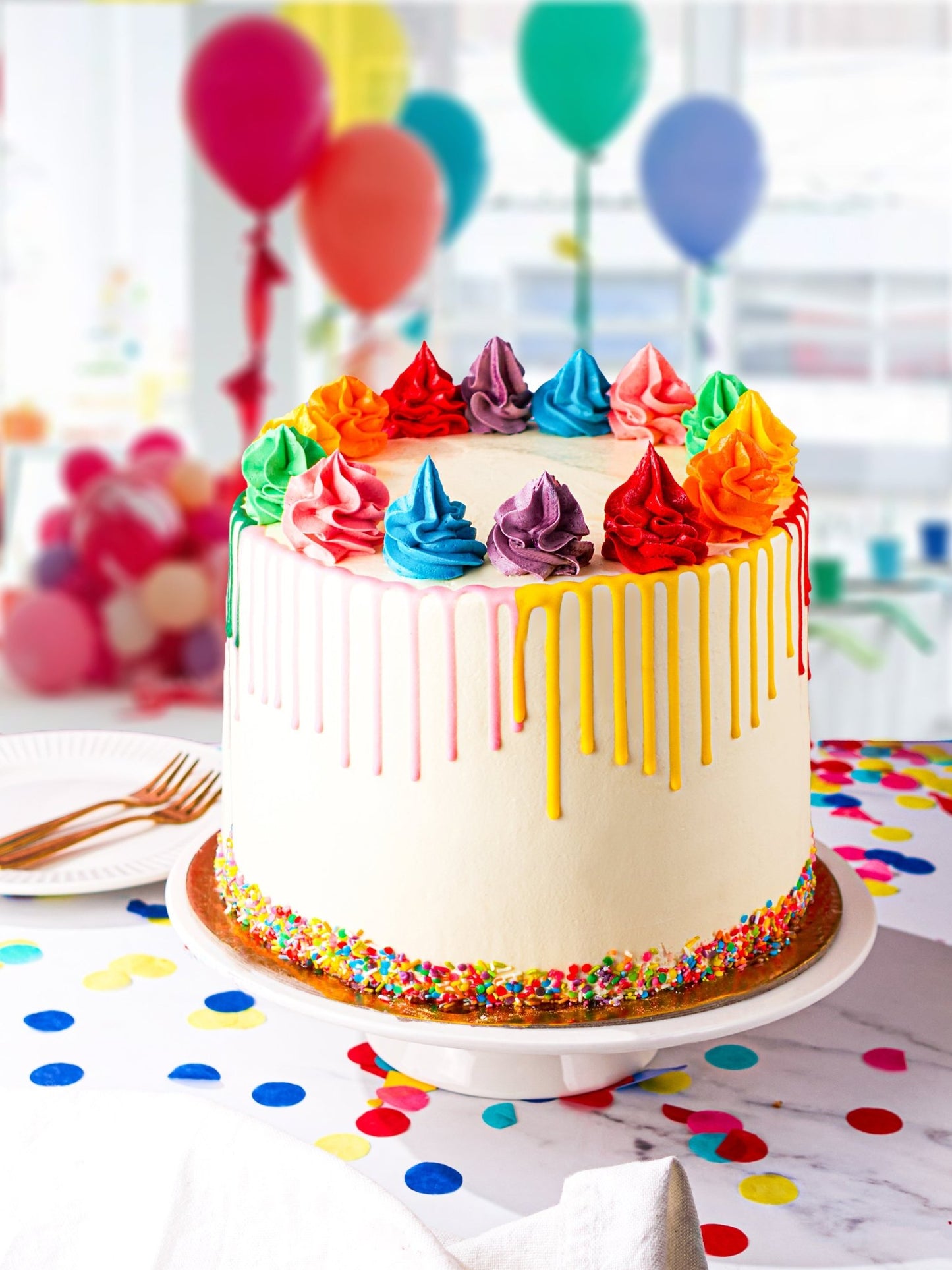 Patisserie Valerie's handmade Rainbow Cake cake delivery