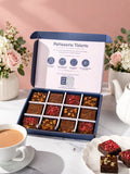 Assorted Kind Bakes vegan brownies in an open Patisserie Valerie gift box