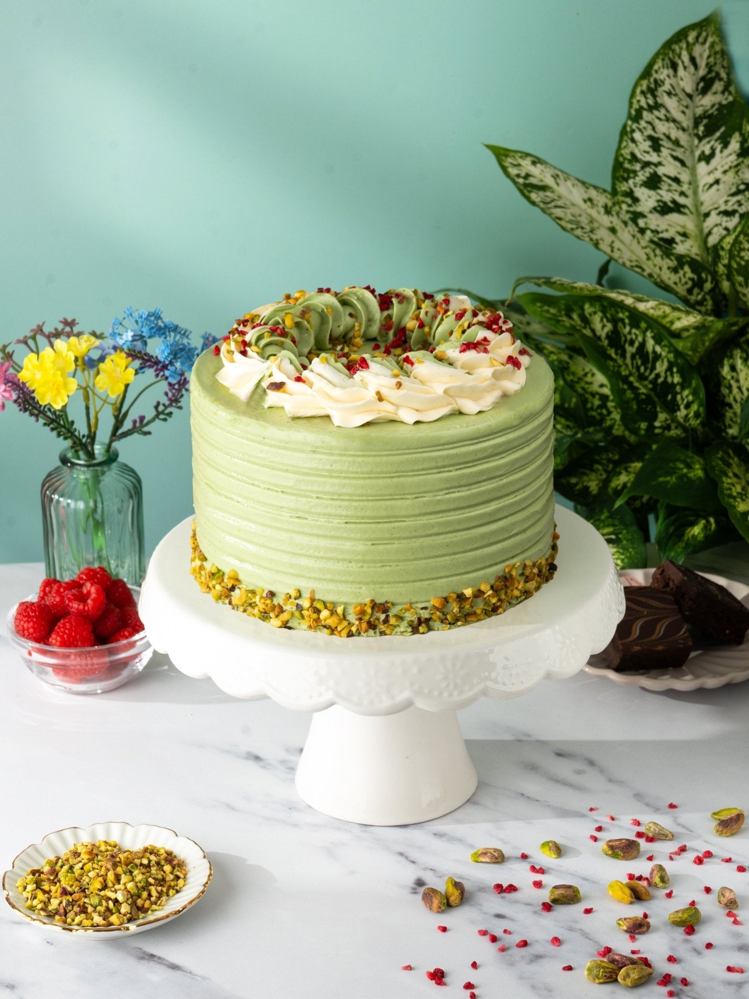 Patisserie Valerie's handmade Pistachio and Raspberry Delight Cake cake delivery 