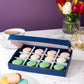 Patisserie Valerie's handmade Pistachio, Vanilla & Rose Macarons Gift Box cake delivery 
