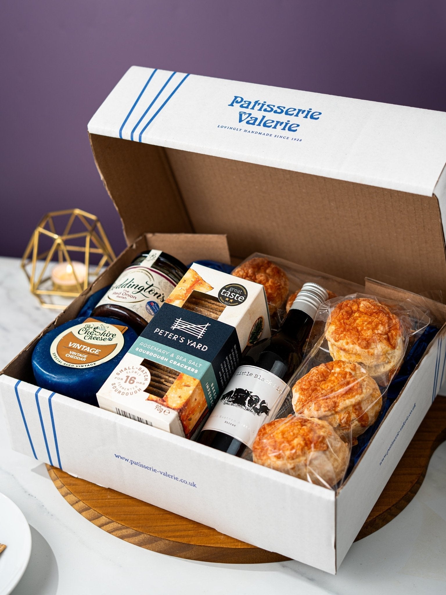 Patisserie Valerie's Vintage Cheese & Wine Gift Hamper — cheese truckle, scones, relish and red wine served