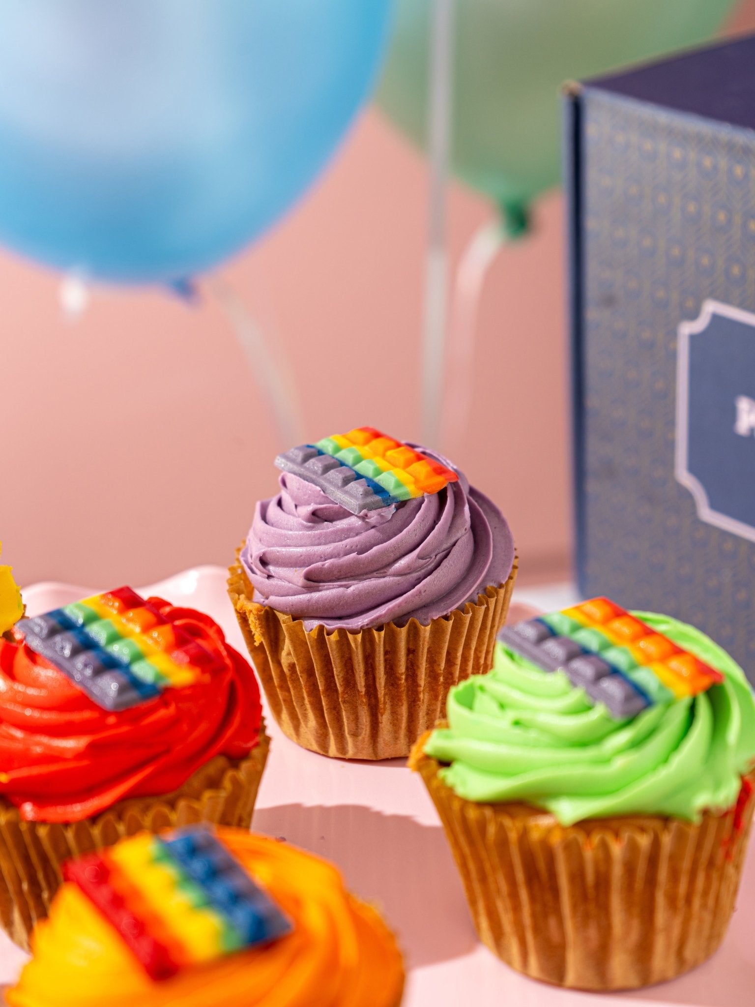 Patisserie Valerie's handmade Rainbow Cupcakes cake delivery 
